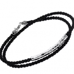 Textile bracelet with bar.